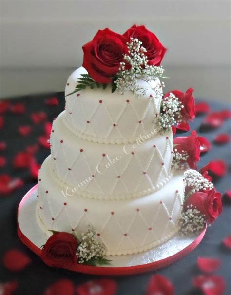 white wedding cake with red roses | Tier White Fondant cake with piped ...