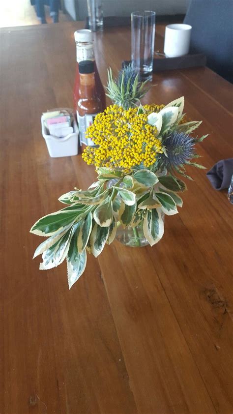 Sedum, yarrow, and sea | Flower arrangements, Sedum, Table decorations