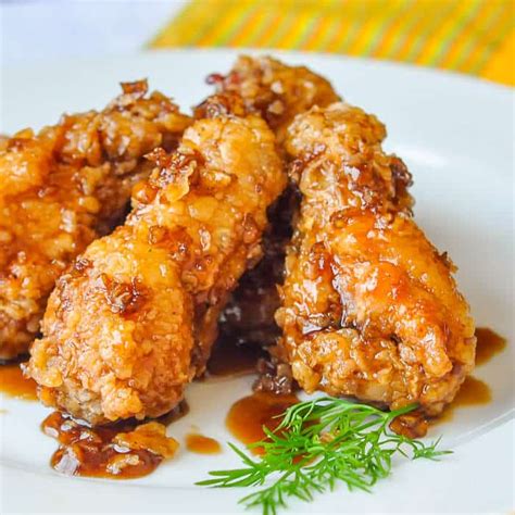 Crispy Honey Garlic Chicken Wings. Tossed in an easy honey garlic sauce.