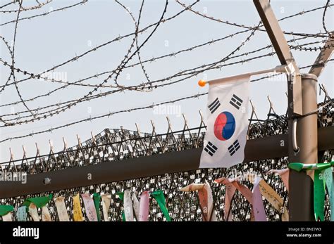 South Korean flag and ribbons on the DMZ fence (Demilitarized Zone) at ...