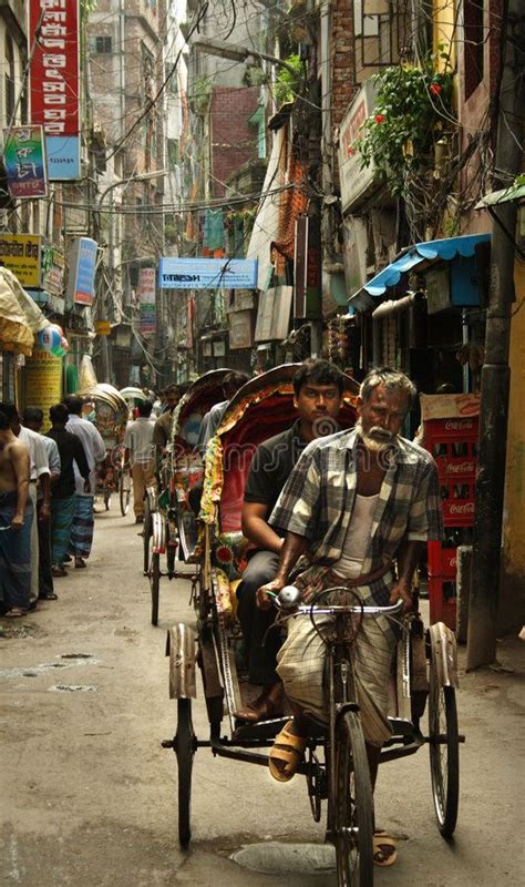 On the streets of Dhaka. Rickshaw ride on the streets of Old Dhaka ...