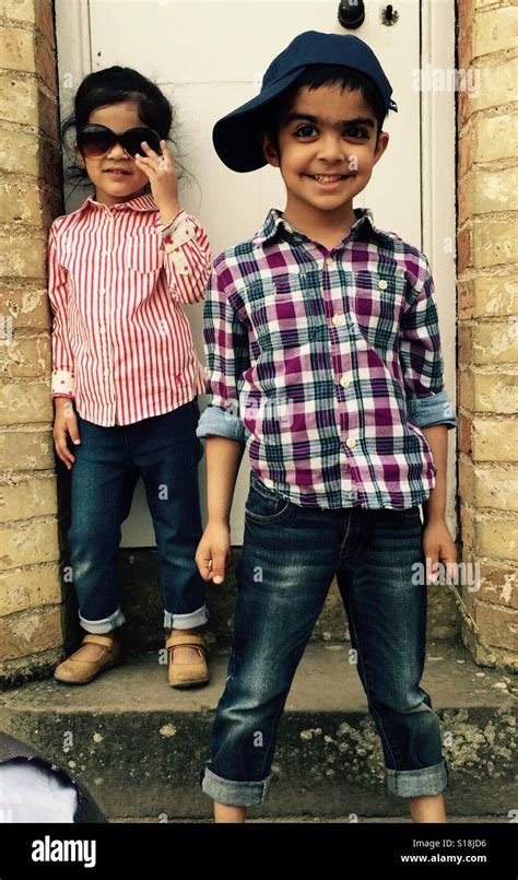 Stylish kids pose for a photo Stock Photo - Alamy