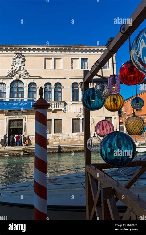 Murano glass lights with reflections hanging opposite Museo del Vetro ...