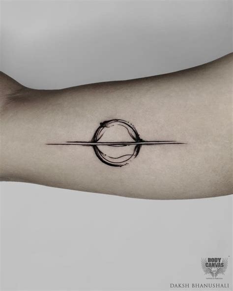 Minimalist Circle Tattoo on Arm