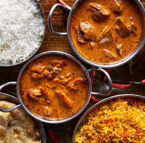 Assortment of Indian Curry and Rice Dishes Stock Photo - Image of naan ...