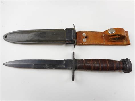 M1 CARBINE BAYONET WITH SCABBARD - Switzer's Auction & Appraisal Service