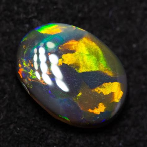 0.61 ct black opal 7.1x5.2x2.4mm - Black Opal Direct