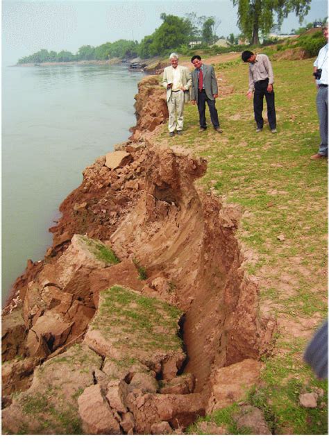 Bank erosion along the Red River due to bank slides probably caused by ...