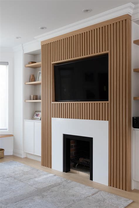 The Wood Slat Accent Of This Living Room Wall Is Perfectly Designed To ...