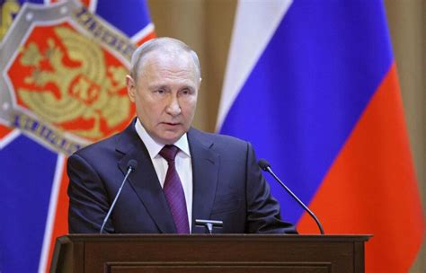 What is that flag behind putin? the one with the coat of arms. : r ...