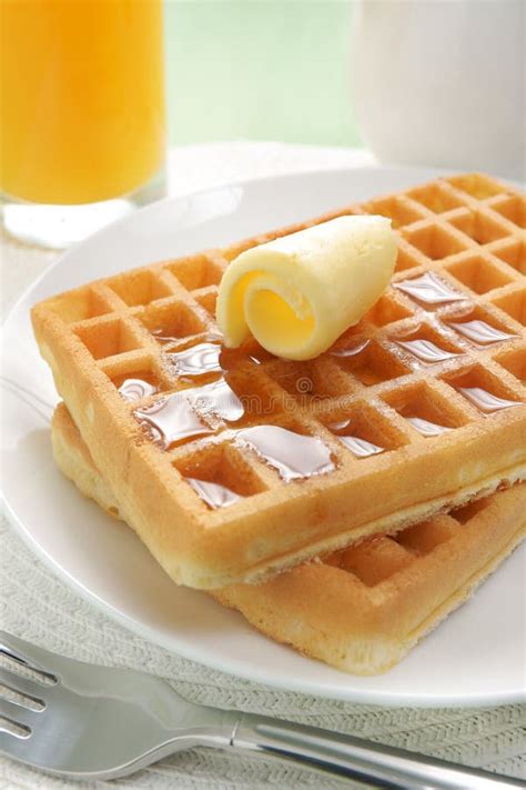 Waffles and maple syrup stock photo. Image of pitcher - 34909670