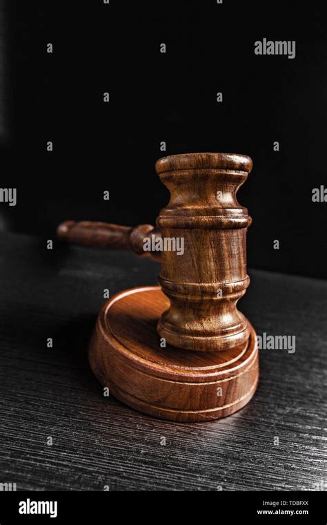 Judge's Gavel over black background Stock Photo - Alamy