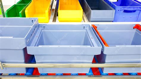 Premium Photo | Automated storage warehouse with blue plastic crates