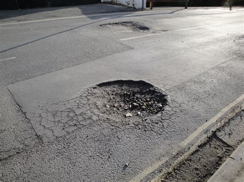 What causes potholes? - Sand Seal Paving