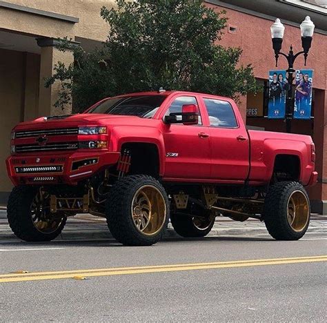 Red Chevy Lifted Truck - 4x4 Big Tires! | Lifted chevy trucks, Trucks ...