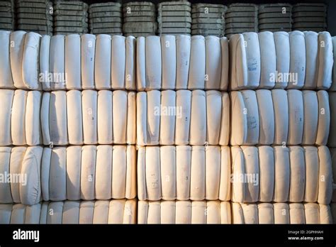 Raw cotton bales in textile factory Stock Photo - Alamy