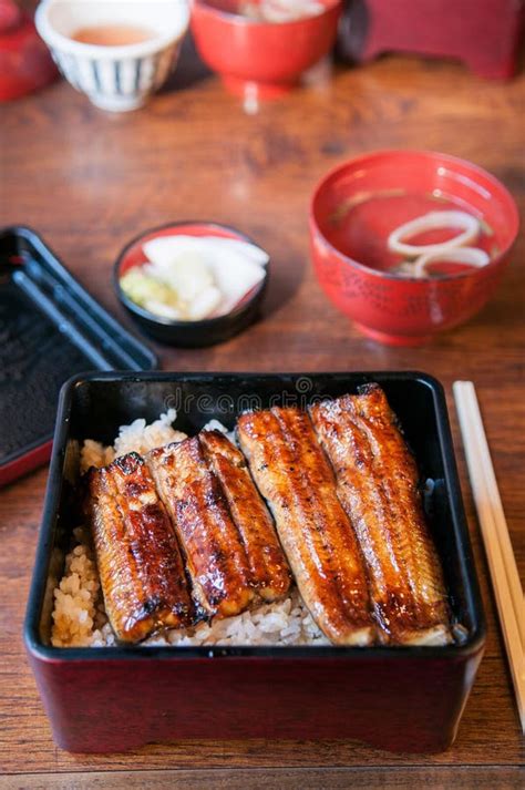 Grilling Unagi Eel for Japanese Unagi Donburi Rice Recipe Stock Image ...