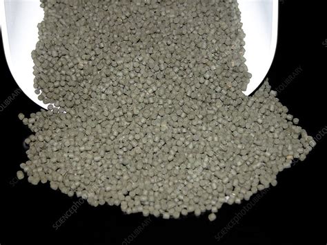 Fish food pellets - Stock Image - C010/9950 - Science Photo Library