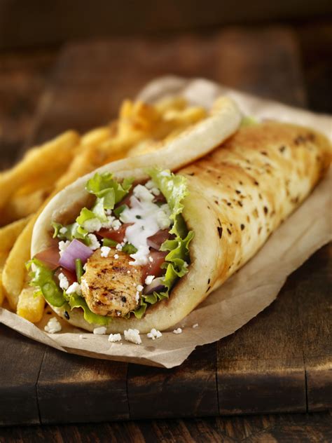 This recipe for chicken shawarma—thinly sliced meat wrapped in pita ...