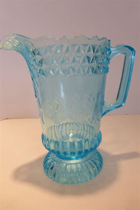 A rare and beautiful large EAPG blue glass water pitcher in the ...