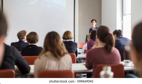 Female Speaker Giving Presentation Lecture Hall Stock Photo 600066308 ...