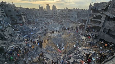 Israel-Gaza latest: Deadly strike on refugee camp 'targeted top Hamas ...