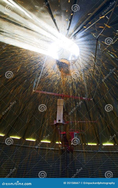 Corn Fills a Silo from Inside Stock Image - Image of filling, machine ...