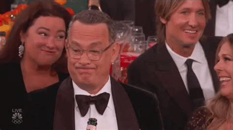 Golden Globes: Here are GIFs of Tom Hanks looking unamused during Ricky ...