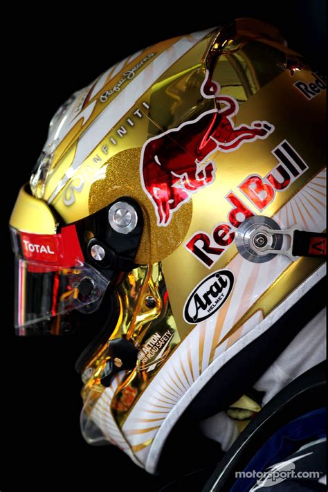 Sebastian Vettel's new gold helmet design