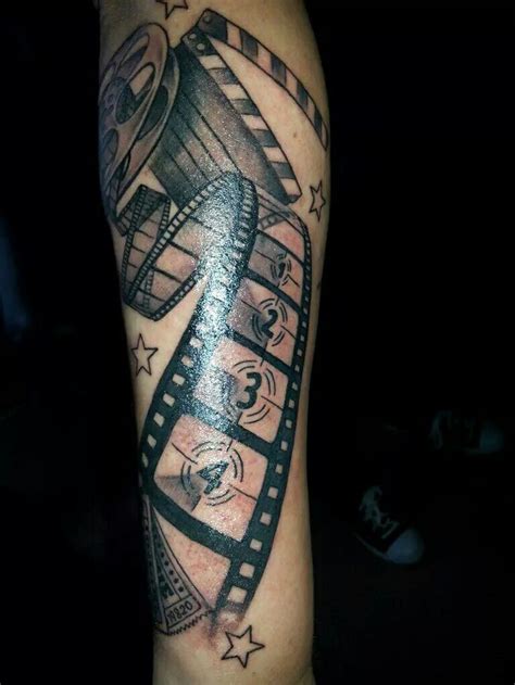 Film Tattoo represents my absolute love for movies.💚🎥🎬 | Camera tattoos ...