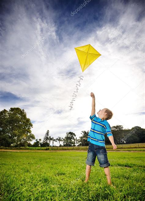 Ambitious boy flying kite — Stock Photo © Daxiao_Productions #11490375