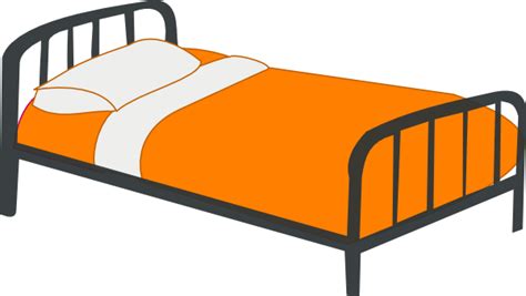 an orange bed with white sheets and pillows