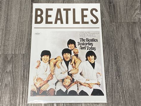 Urban Auctions - THE BEATLES BUTCHER ALBUM COVER POSTER (12”X18”)