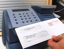 The Advantages of Postage Meter Machines vs. Online Postage & Stamps