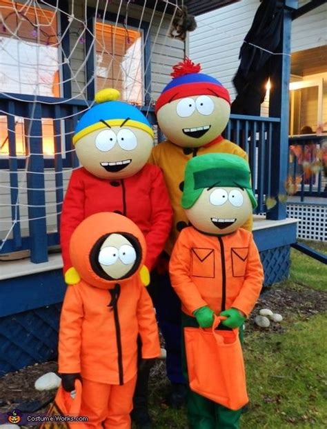 three people dressed in orange and green standing next to each other on ...