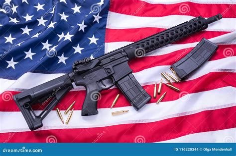 Custom Built AR-15 Carbine, Bullets and a Magazine on American Flag ...