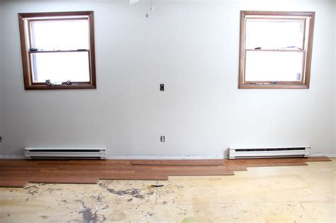 Installing Laminate Flooring (and a new rug too!) - Bright Green Door