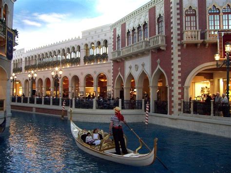 Venetian Gondola Ride Photograph by Peggy Leyva Conley