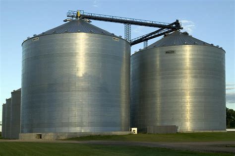 Corn Silos In Orfordville, Wisconsin Photograph by Mark Harmel - Fine ...