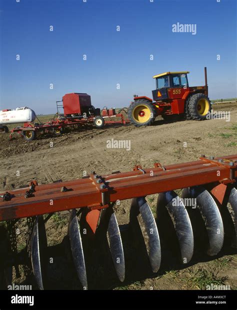 APPLYING DRY FERTILIZER AND ANHYDROUS AMMONIA TOGETHER, ON GROUND PRIOR ...