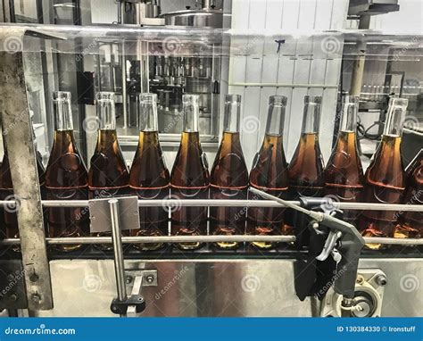 Cognac Bottling Production Line Stock Photo - Image of moving ...