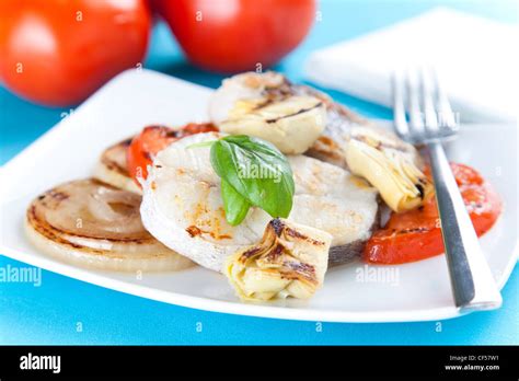 slice of hake grilled Stock Photo - Alamy