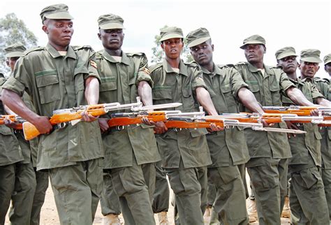 Somali soldiers at their passing-out ceremony in Uganda in May 2012 ...