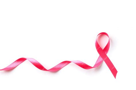 Premium Photo | Pink awareness ribbon isolated on white