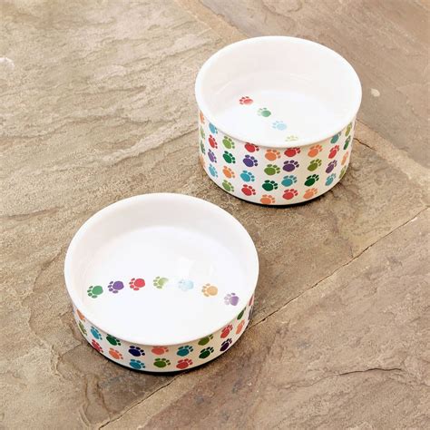 paw print ceramic dog food and water bowl by noah's ark ...