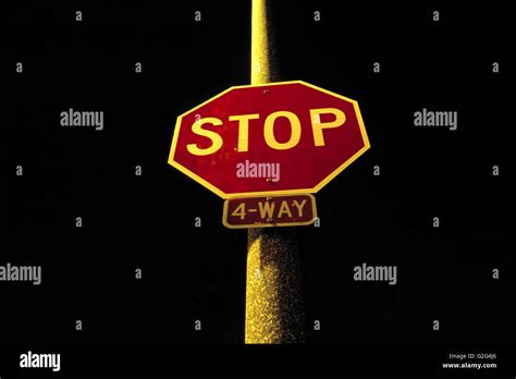 Stop Sign at Night Stock Photo - Alamy