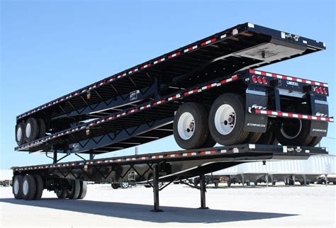 Steel-Flatbed-Trailers-Three-Stacked - Jet Co Trailers