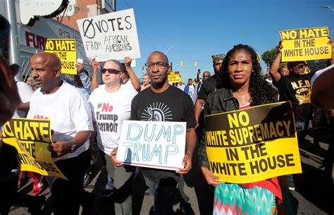 Angry protesters rally around church during Trump's Detroit visit - CBS ...