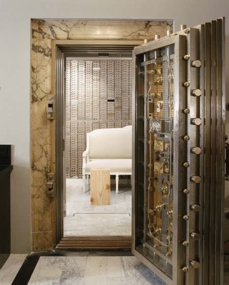 Room with a bank vault door | StashVault