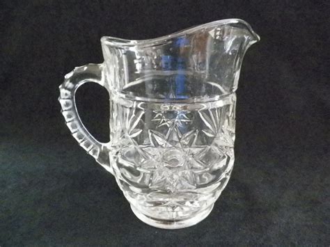 Small Clear Pressed Glass Pitcher Starburst by JSVintageVillage